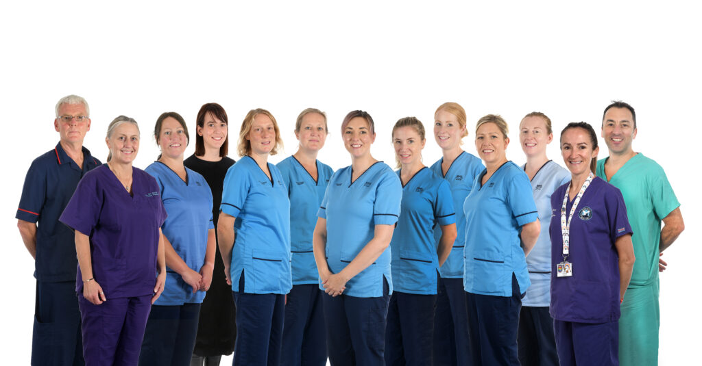 trauma rehab team standing in a group